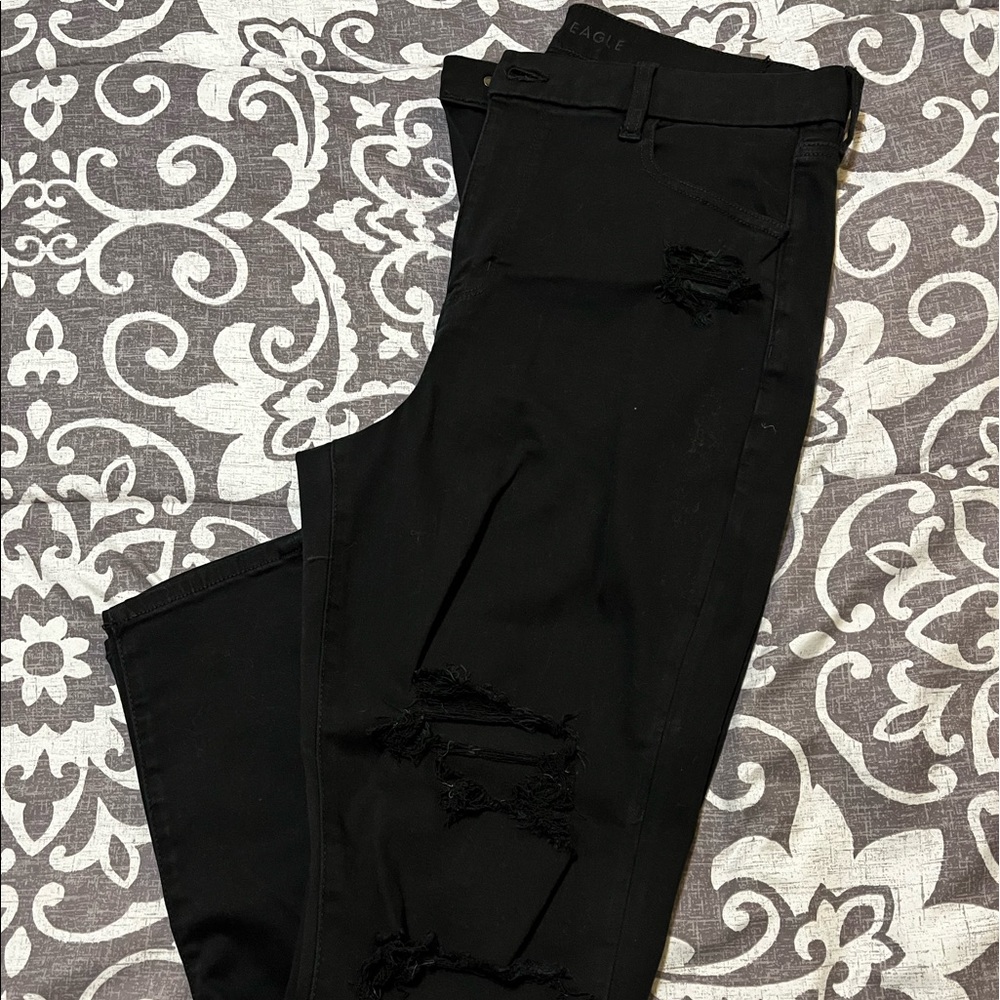 High waisted black ripped skinny jeans